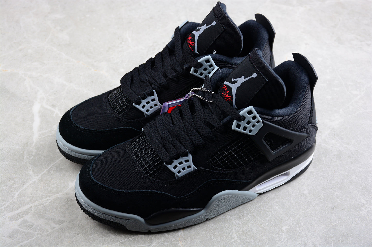 AJ4 Retro "Black Canvas"