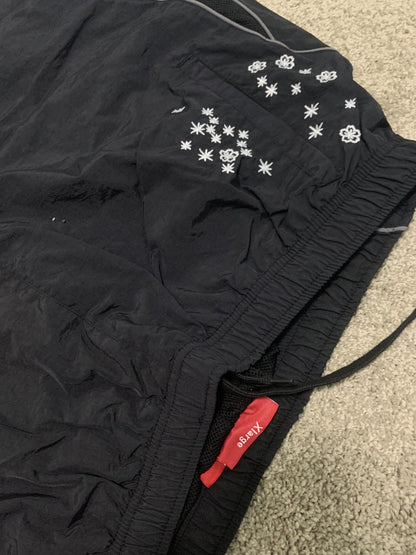 Supreme AOI Glow Track Pants