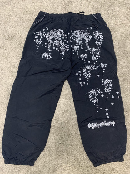 Supreme AOI Glow Track Pants