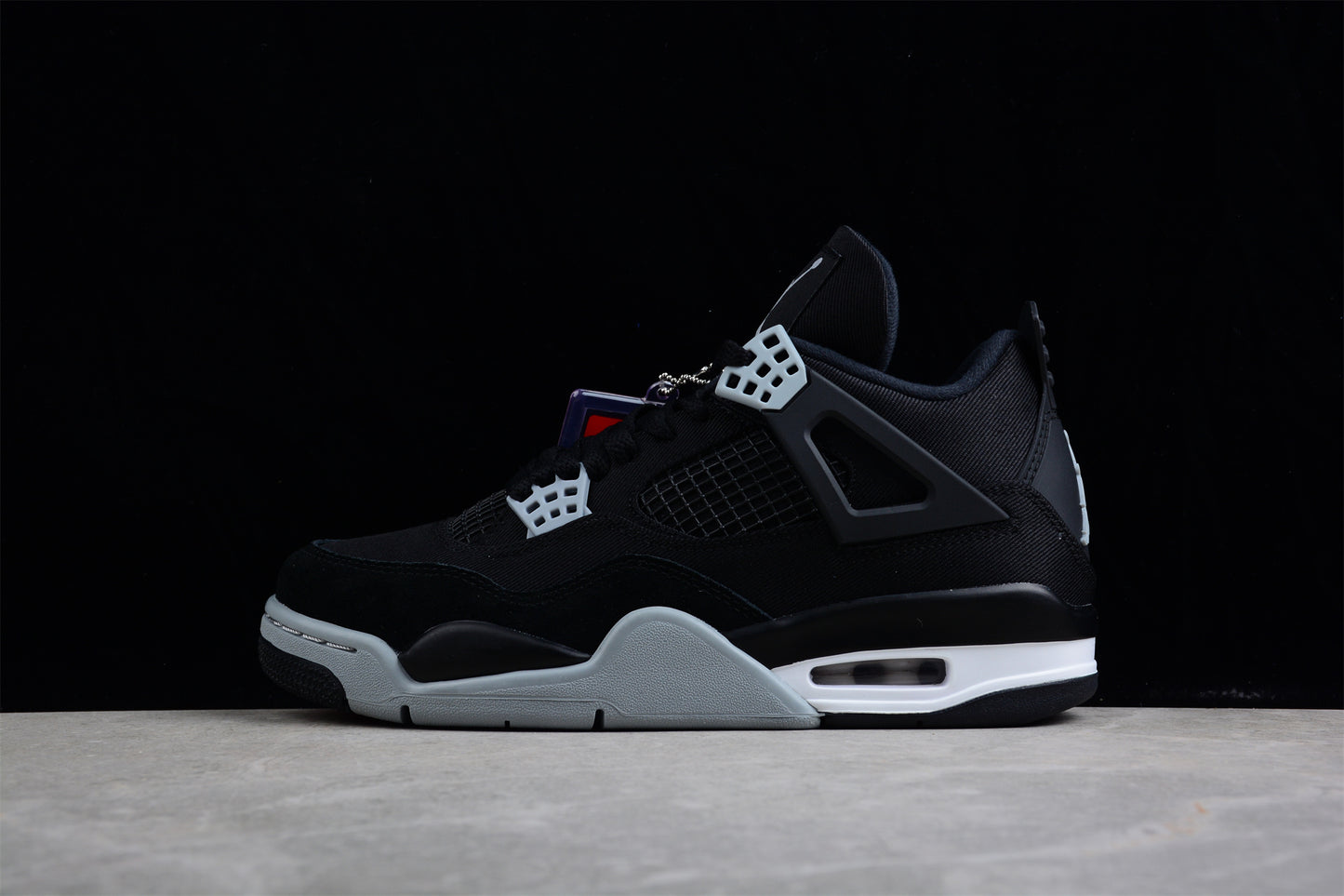 AJ4 Retro "Black Canvas"