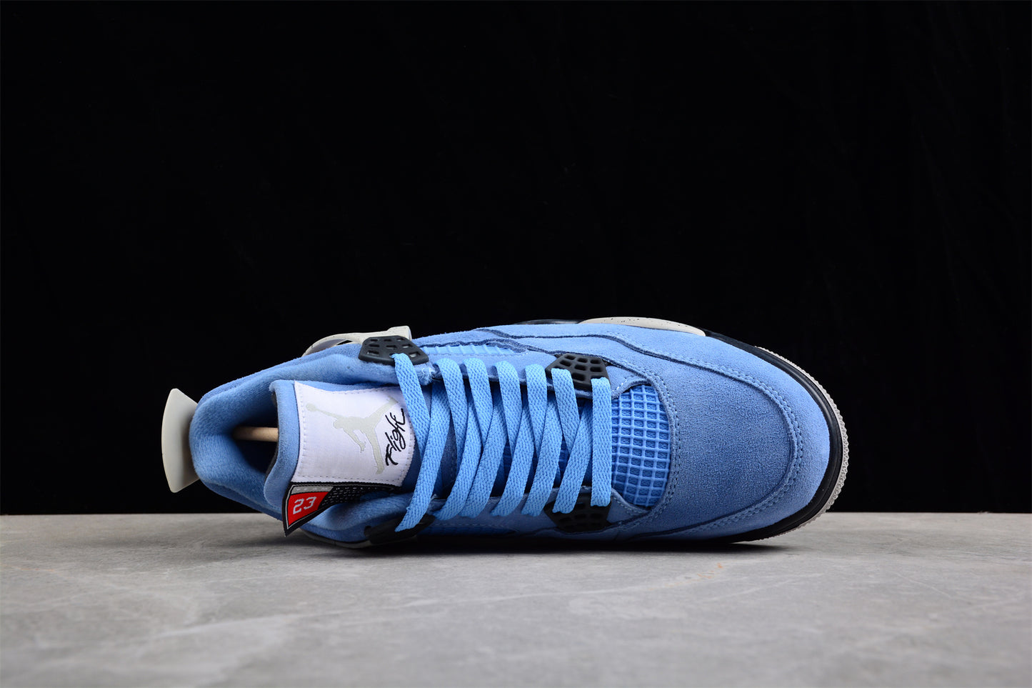 AIR JORDAN 4 RETRO "UNIVERSITY BLUE" AZUL 